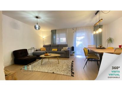 Sala d'estar de Casa adosada en venda en Castellón de la Plana / Castelló de la Plana amb Aire condicionat, Jardí privat i Piscina comunitària