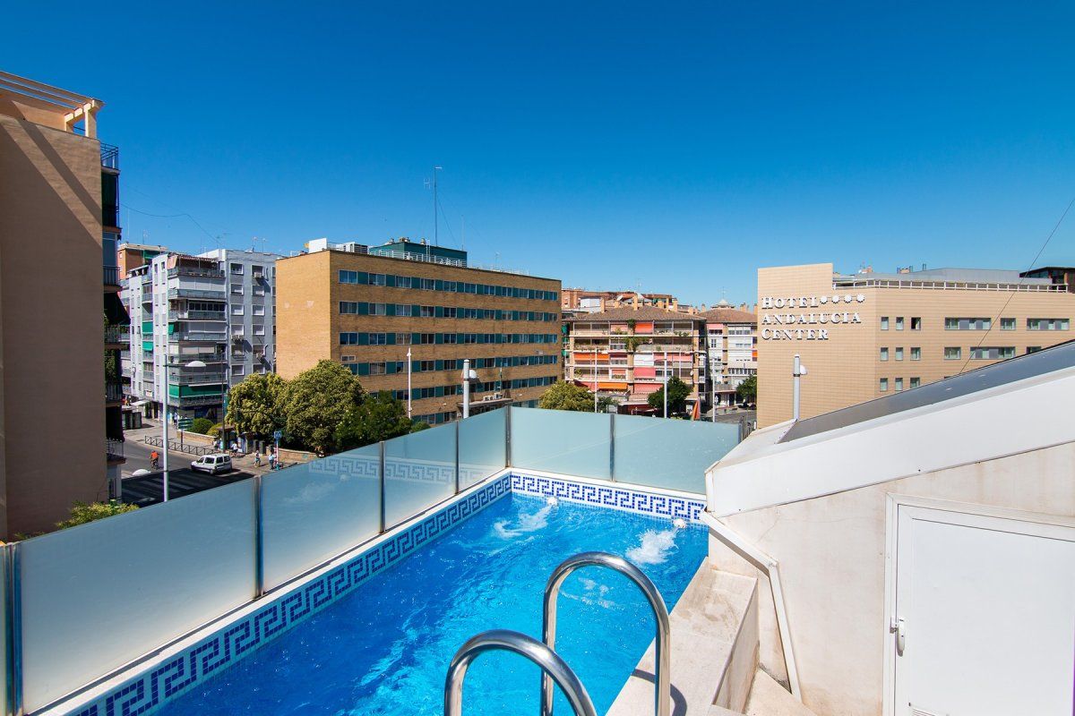 Swimming pool of Single-family semi-detached for sale in  Granada Capital  with Air Conditioner, Heating and Terrace