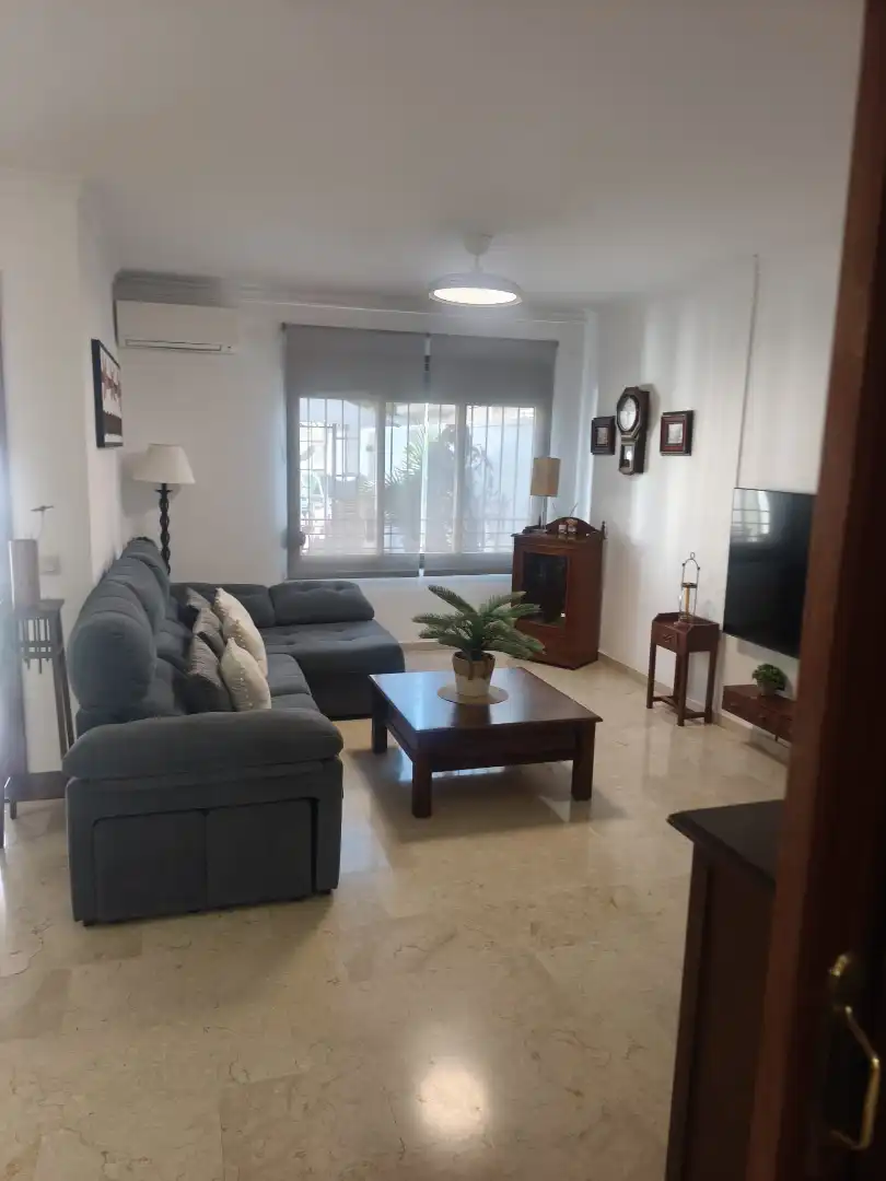 Sala d'estar de Casa adosada en venda en Melilla amb Aire condicionat, Jardí privat i Terrassa