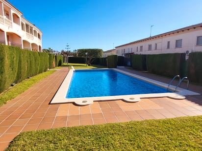 Swimming pool of Single-family semi-detached for sale in El Vendrell  with Air Conditioner, Private garden and Terrace