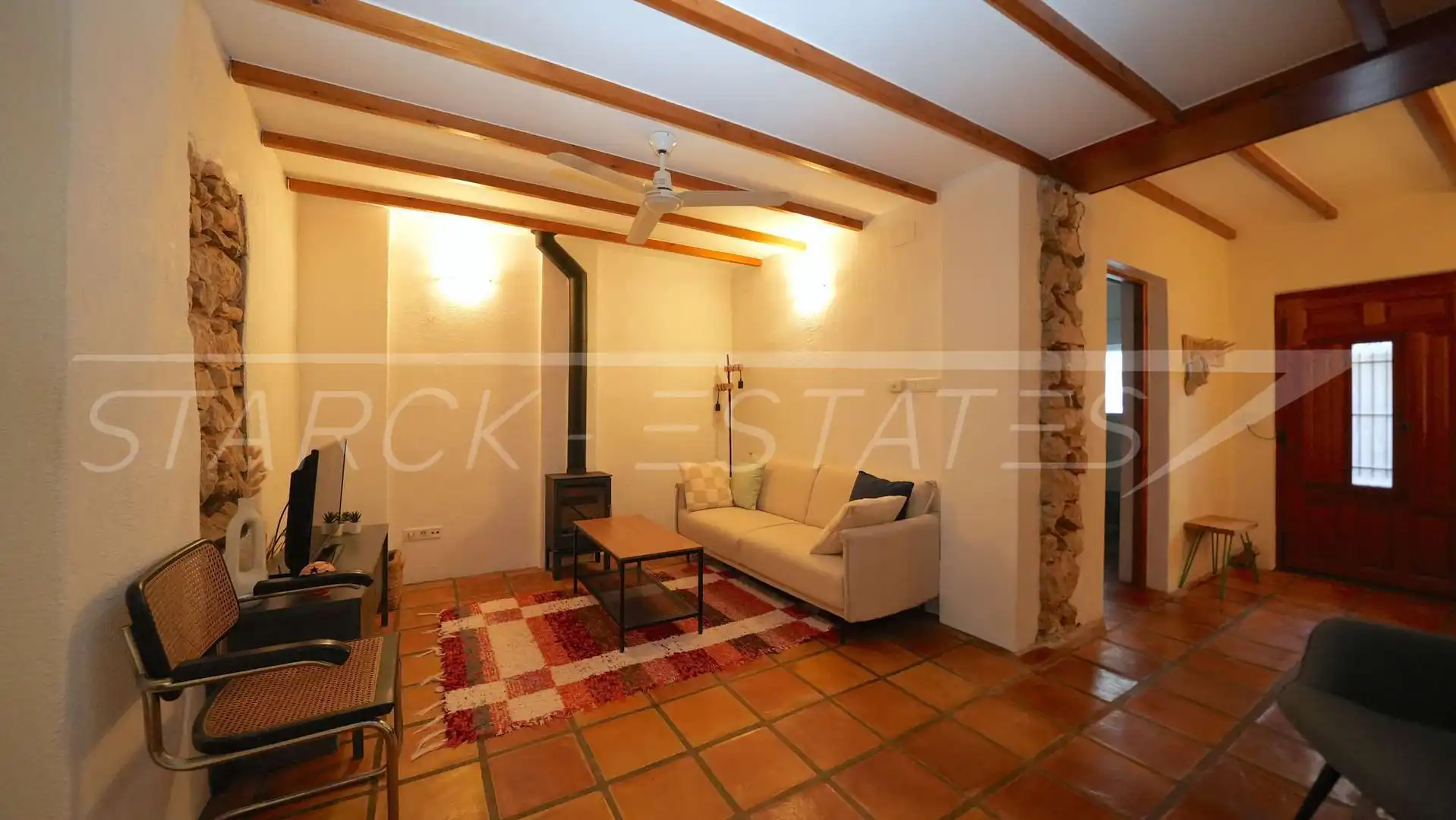 Sala de estar de Casa adosada en venta en Benidoleig