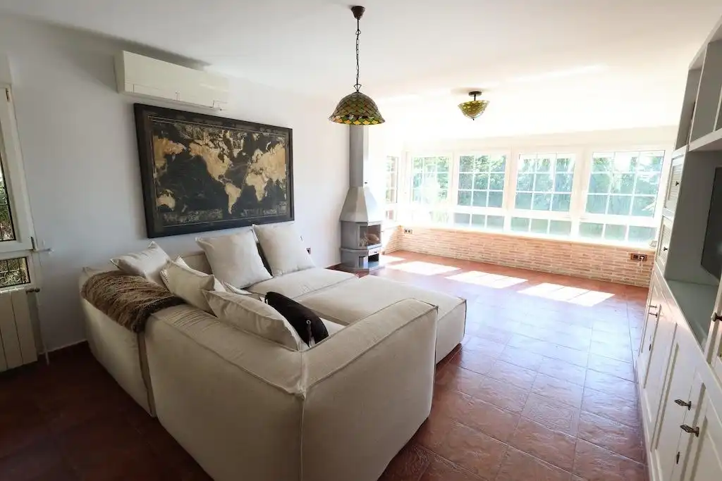 Sala d'estar de Casa o xalet en venda en Orihuela amb Aire condicionat, Jardí privat i Terrassa