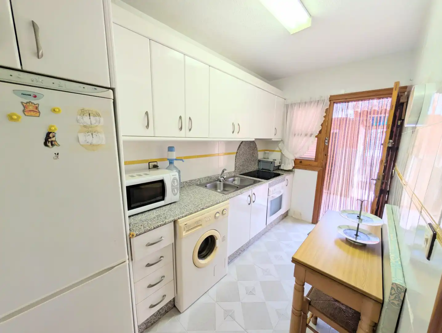Cocina de Casa adosada en venta en Mazarrón con Aire acondicionado, Jardín privado y Terraza