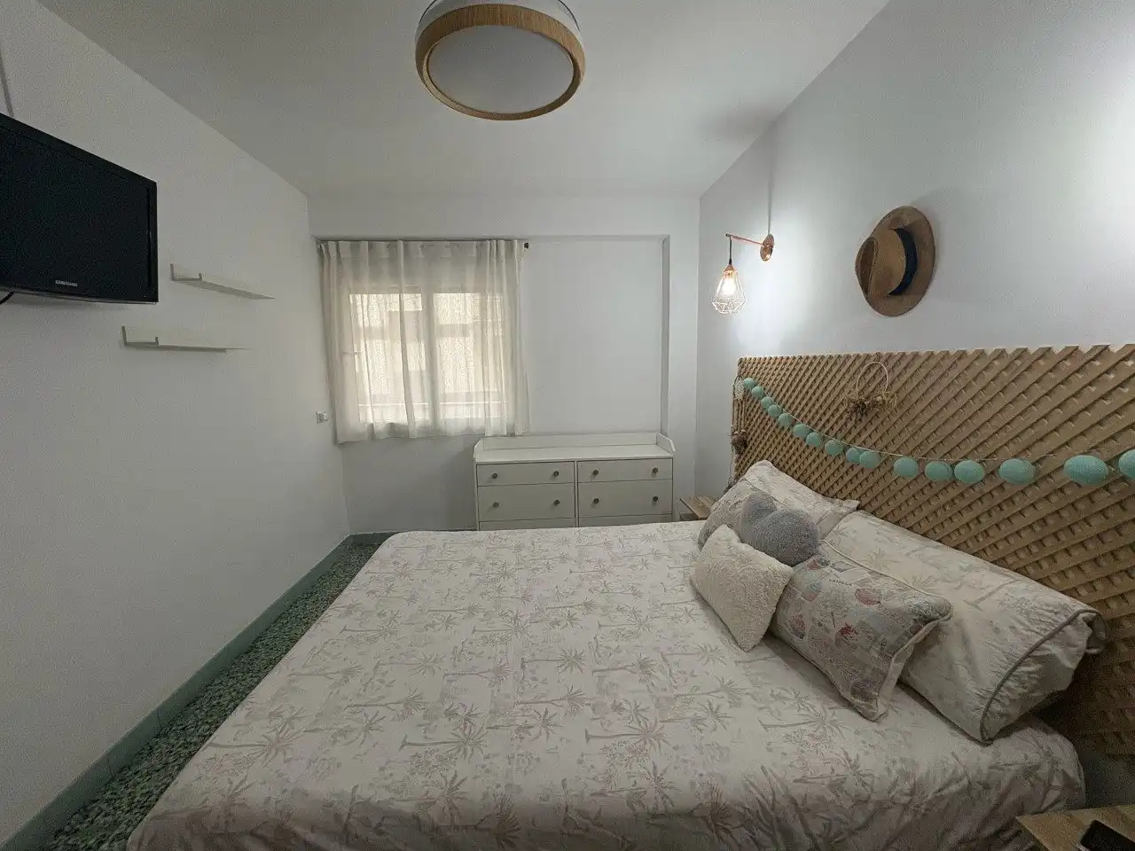 Schlafzimmer von Wohnung zum Verkauf in Cullera mit Klimaanlage, Privatgarten und Terrasse