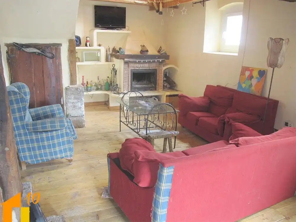 Living room of Houses for sale in Revillarruz  with Heating and Storage room