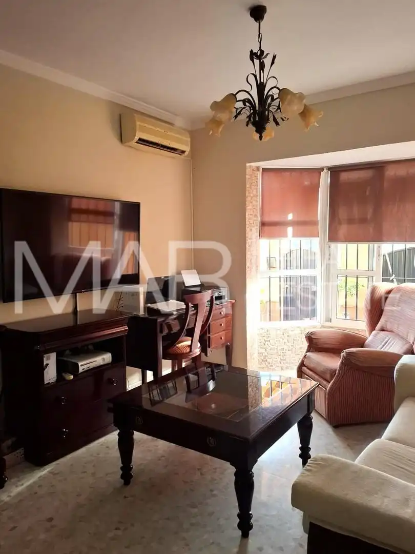 Sala de estar de Casa adosada en venta en Chiclana de la Frontera con Aire acondicionado y Balcón