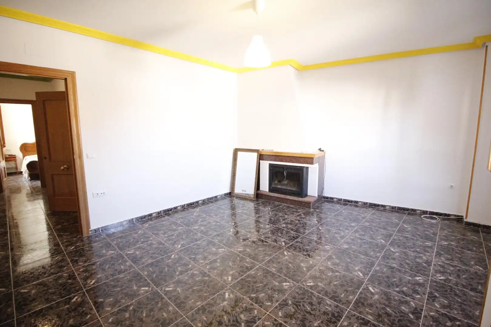 Sala d'estar de Casa o xalet en venda en Baza amb Calefacció i Balcó