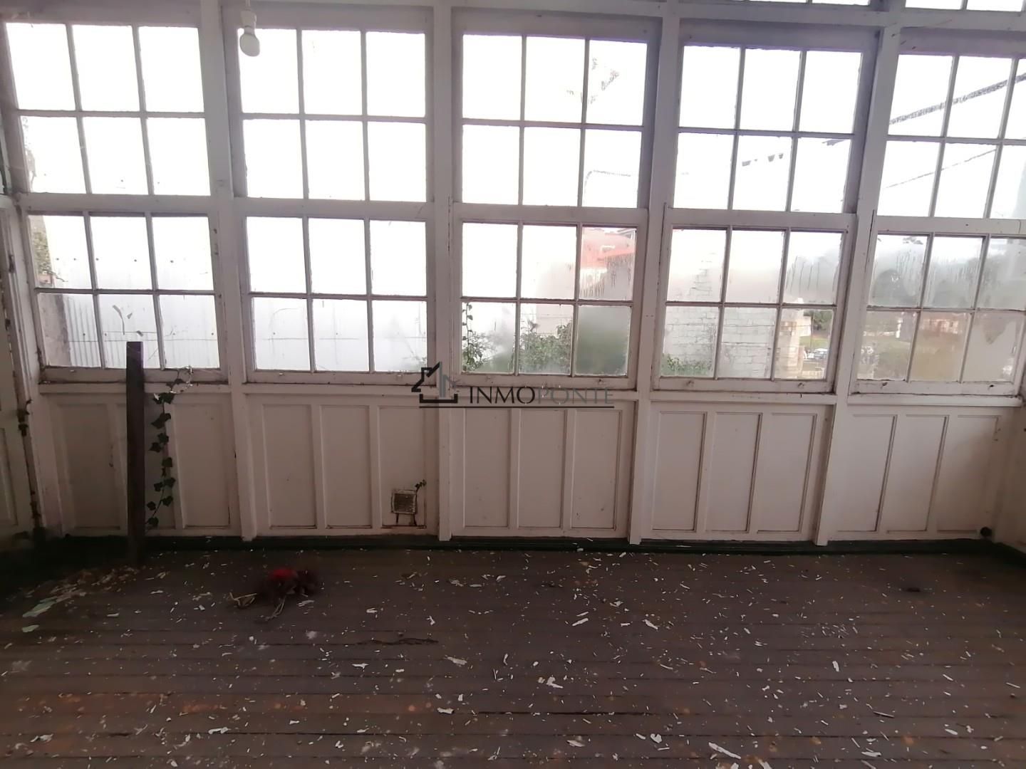 Vista exterior de Casa adosada en venda en Moraña amb Jardí privat