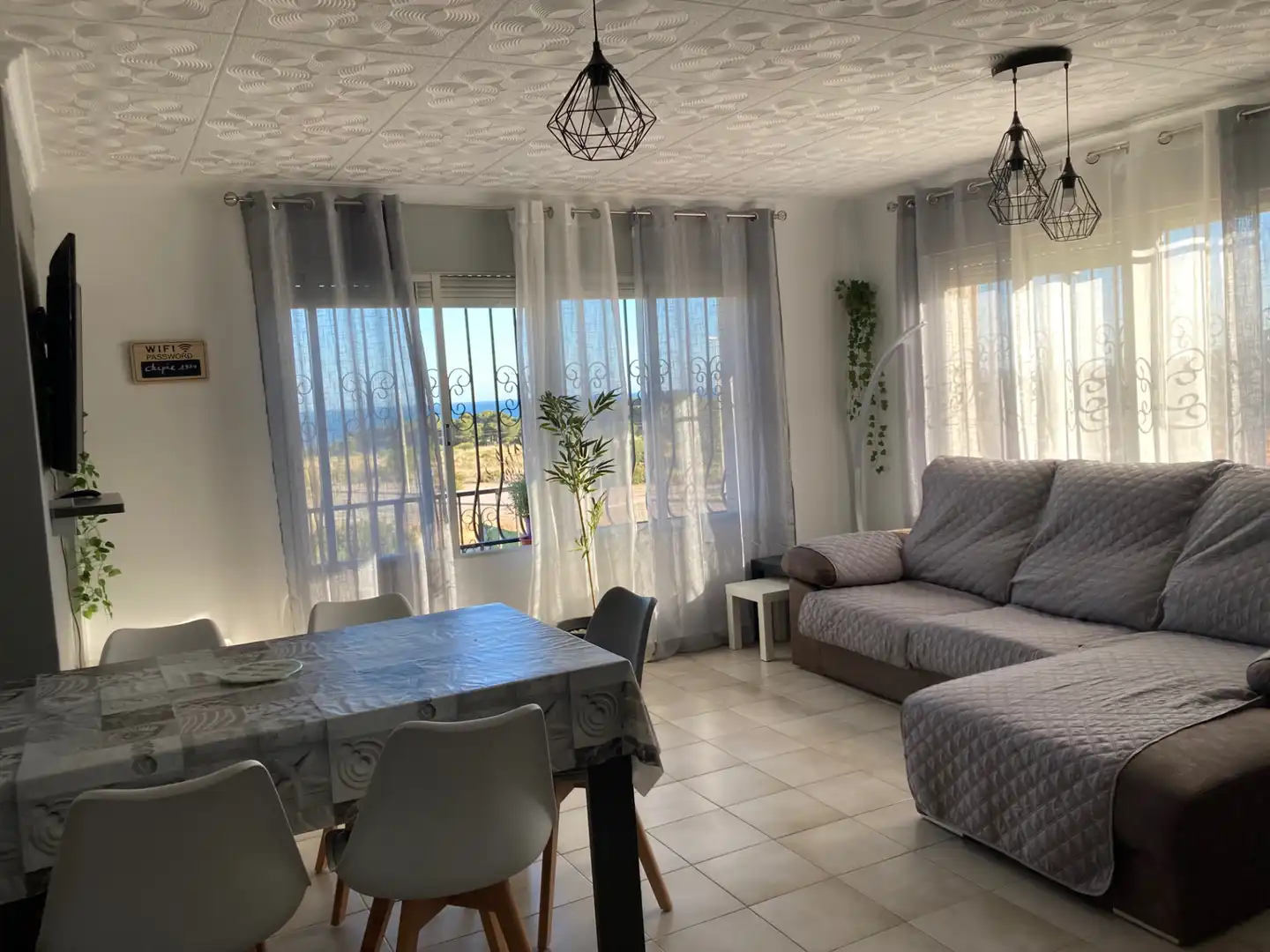 Sala d'estar de Casa o xalet de lloguer en Peñíscola / Peníscola amb Aire condicionat, Jardí privat i Terrassa