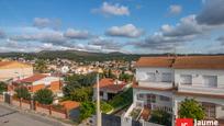 Exterior view of Single-family semi-detached for sale in La Pobla de Montornès    with Air Conditioner, Heating and Private garden