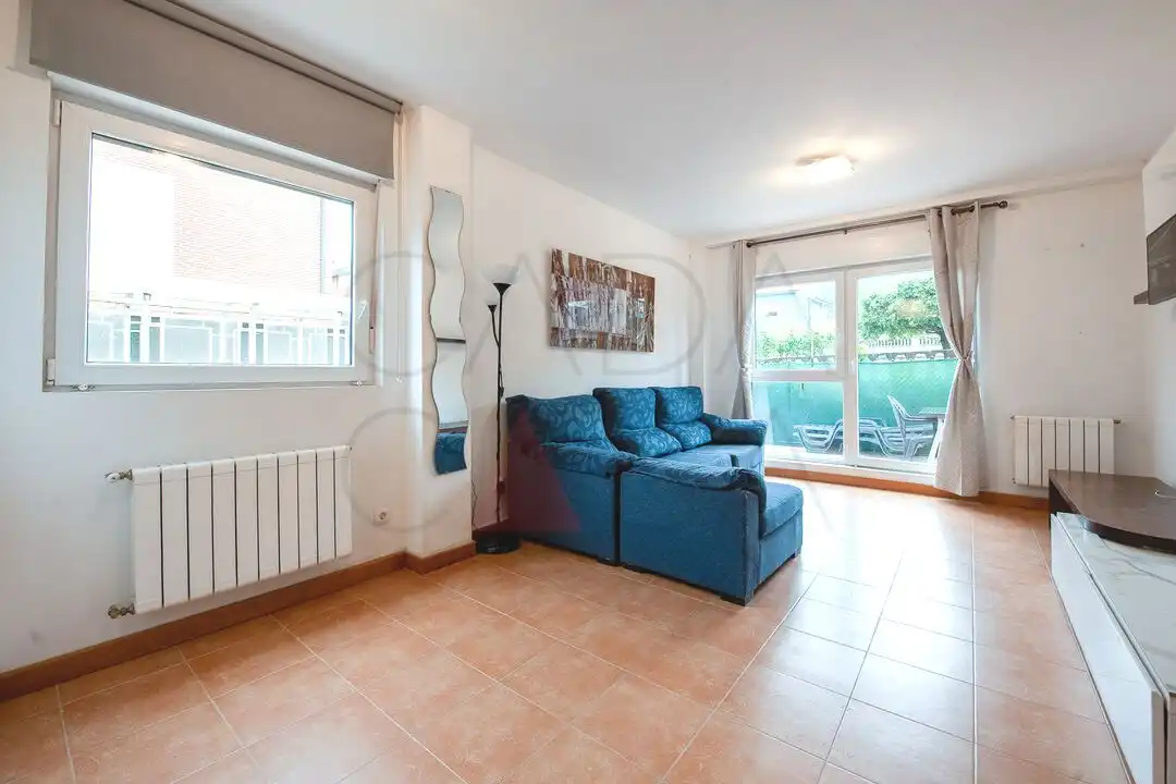 Sala de estar de Casa adosada en venta en Piélagos con Calefacción, Jardín privado y Terraza