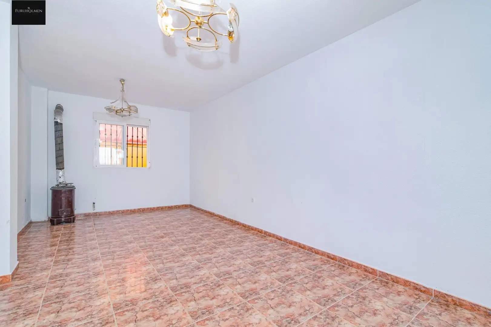Sala d'estar de Casa adosada en venda en Las Gabias amb Balcó