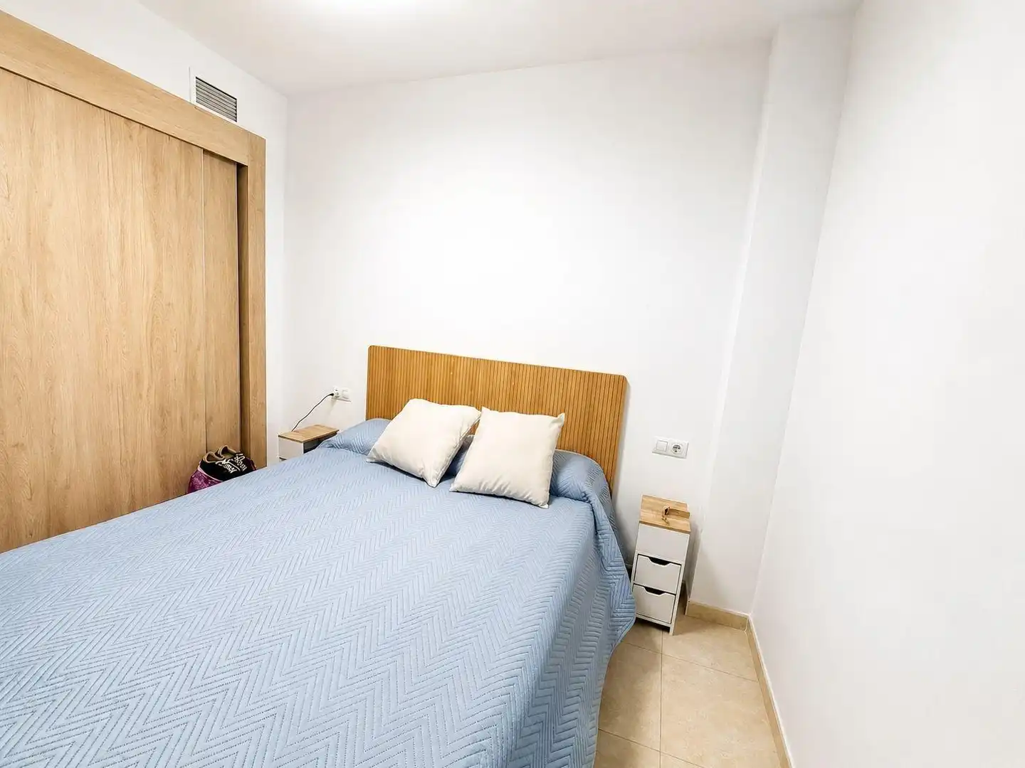 Dormitori de Apartament de lloguer en Daimús amb Aire condicionat, Moblat i Piscina comunitària