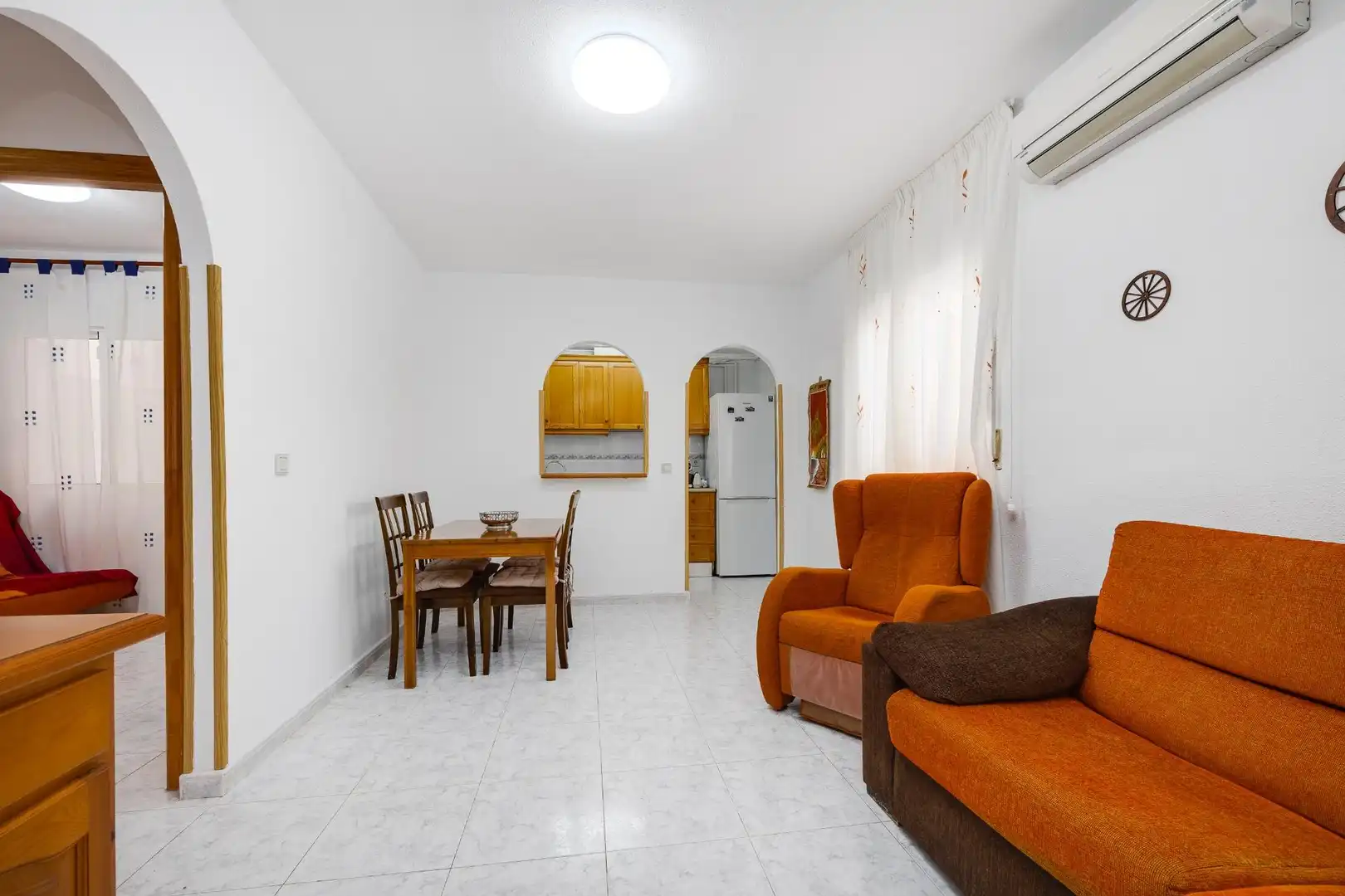 Sala d'estar de Apartament en venda en Torrevieja amb Aire condicionat, Jardí privat i Terrassa