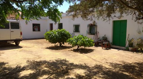 VENDO  BONITA FINCA DE 10.000 M CON CORTIJO Y VIVIENDAS , GARAJES ETC.