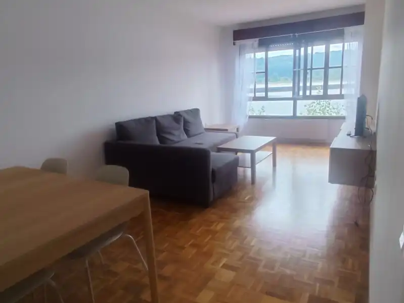 Sala d'estar de Pis de lloguer en Muros de Nalón amb Calefacció, Moblat i Forn