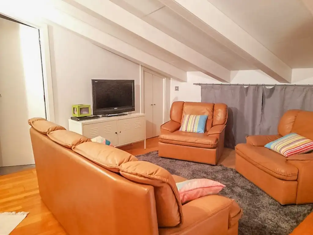 Sala d'estar de Casa adosada en venda en Pollença