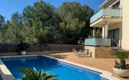 Swimming pool of House or chalet for sale in Calafell  with Air Conditioner, Terrace and Swimming Pool