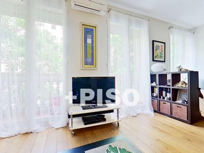 Living room of Flat for sale in  Madrid Capital  with Air Conditioner and Balcony