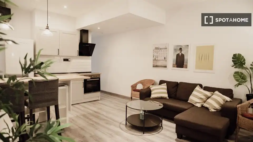 Sala de estar de Piso para compartir en Barcelona con Aire acondicionado, Calefacción y Amueblado
