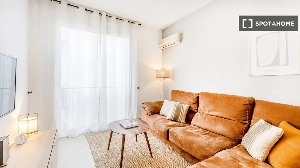 Sala de estar de Piso para compartir en Barcelona con Aire acondicionado, Calefacción y Amueblado