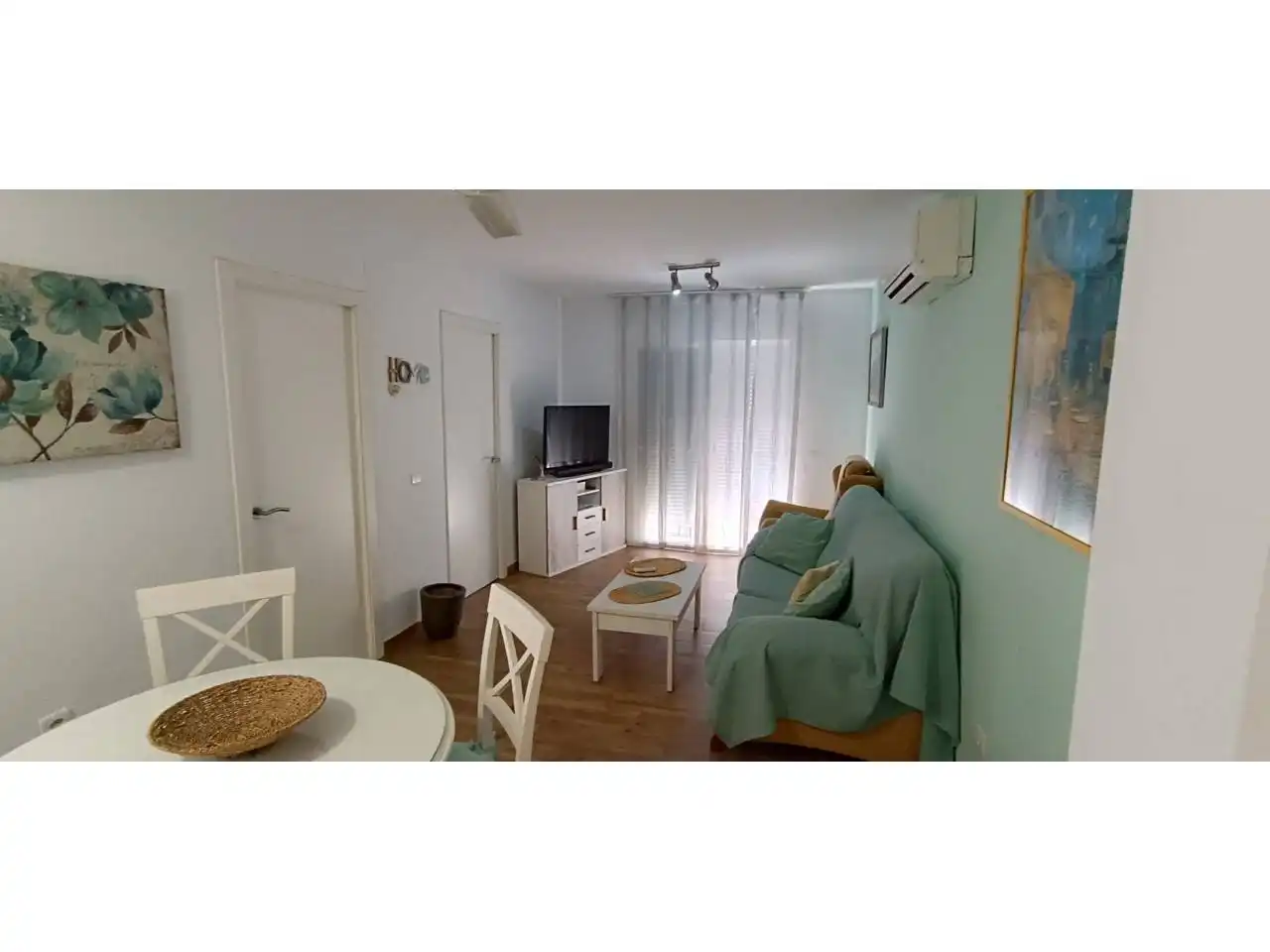 Sala de estar de Piso en venta en Roquetas de Mar con Aire acondicionado, Trastero y Amueblado