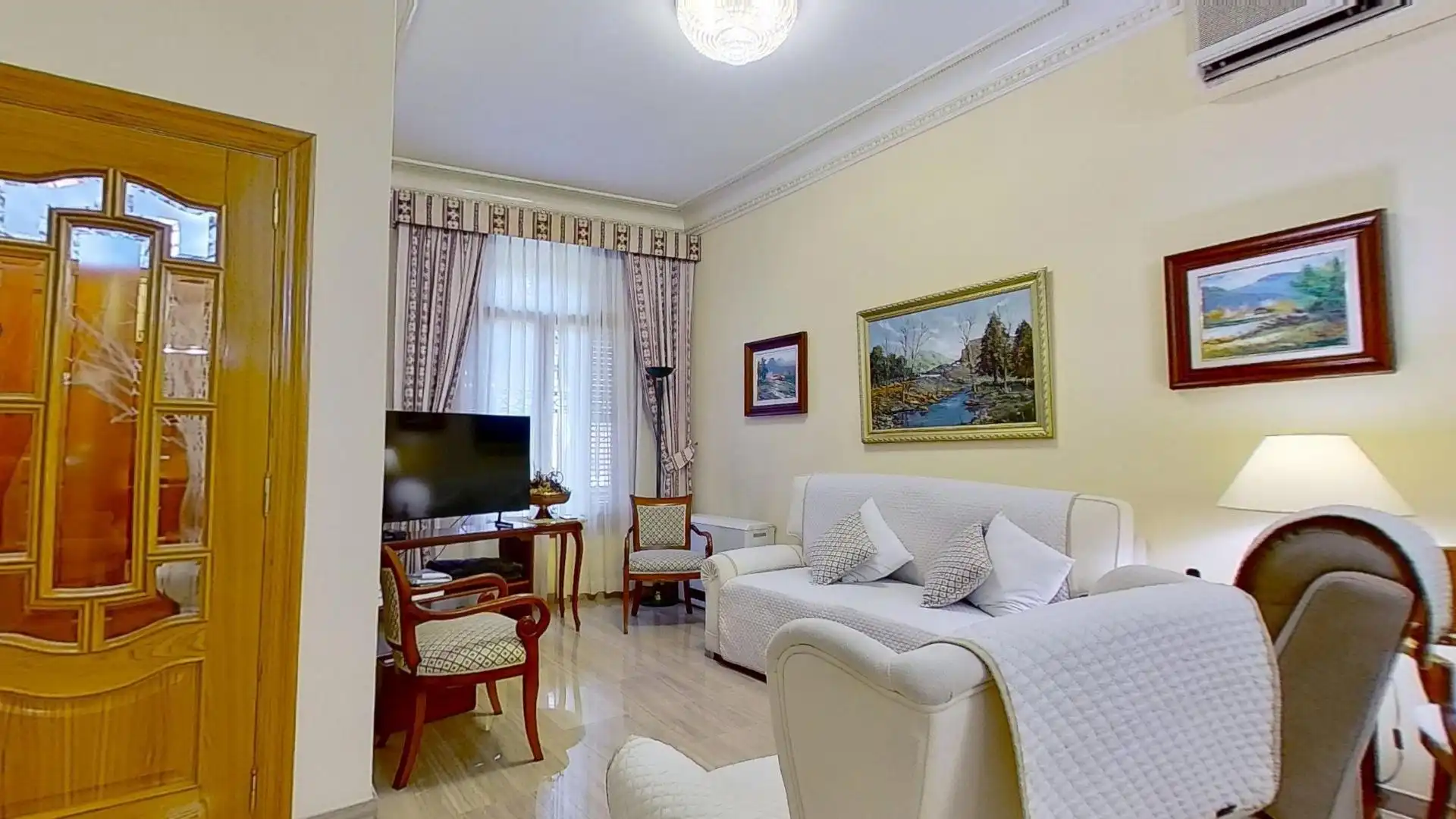 Sala d'estar de Casa adosada en venda en Alboraya