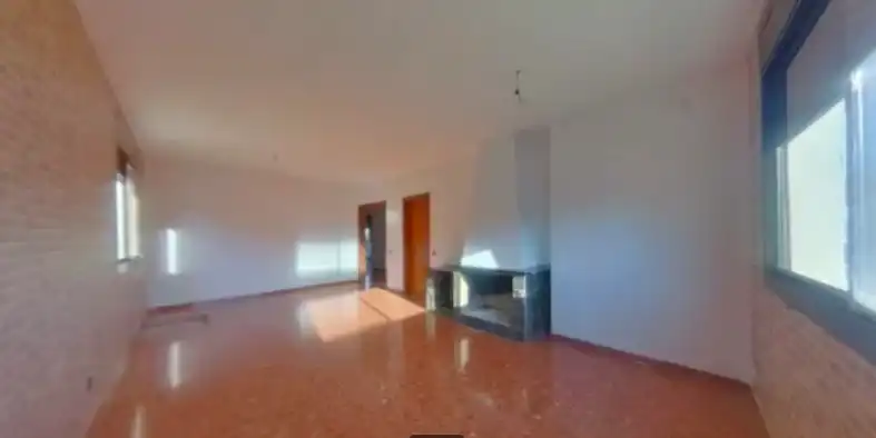 Sala d'estar de Casa adosada en venda en Torrelles de Foix