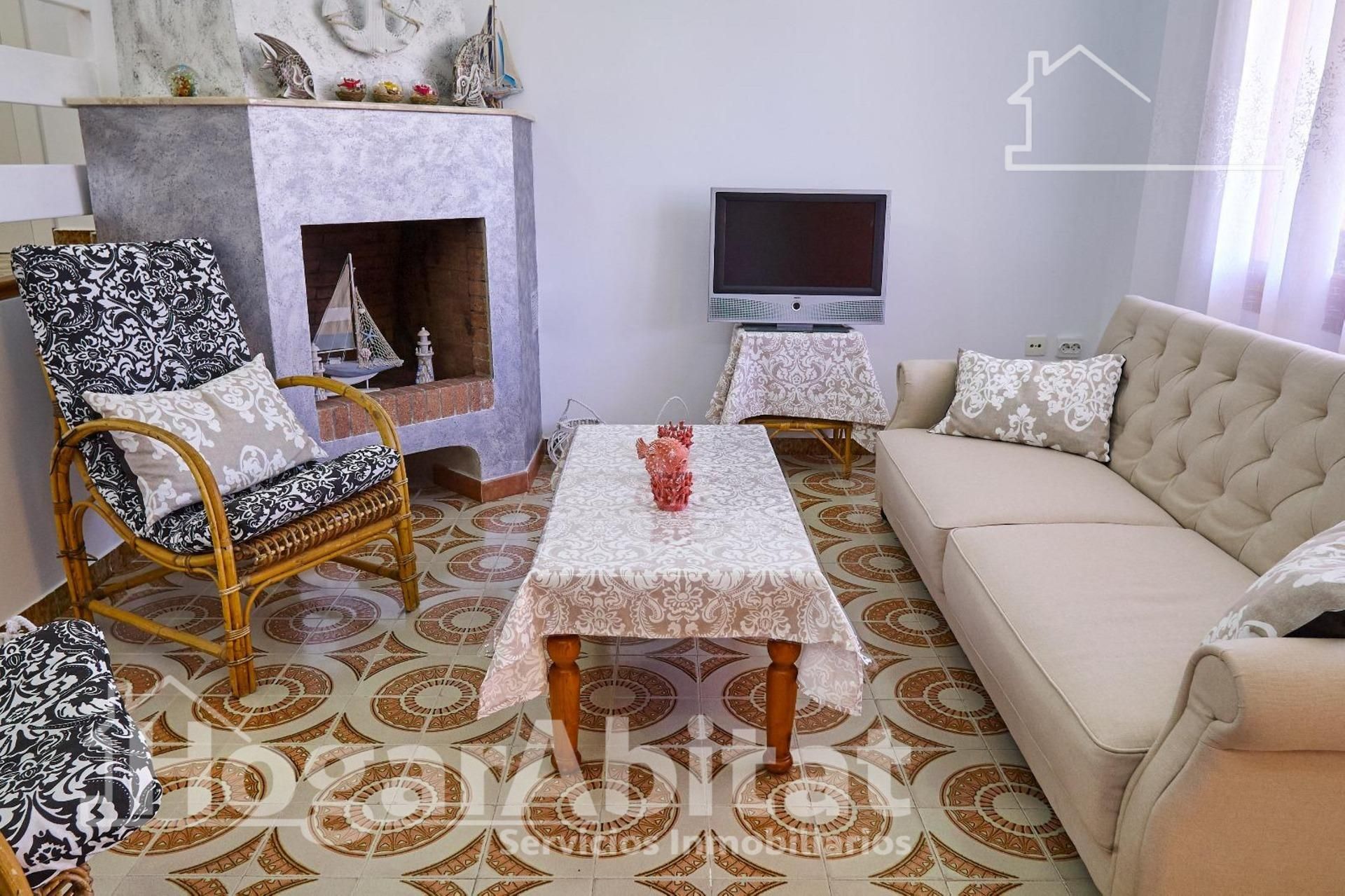 Sala de estar de Casa adosada en venta en Sueca con Terraza, Amueblado y Piscina comunitaria