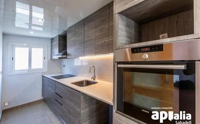 Kitchen of Flat for sale in Sabadell  with Air Conditioner and Balcony