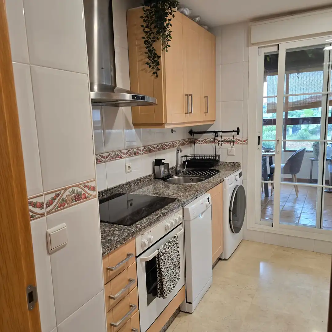 Kitchen of Attic for sale in Benalmádena  with Air Conditioner, Terrace and Storage room