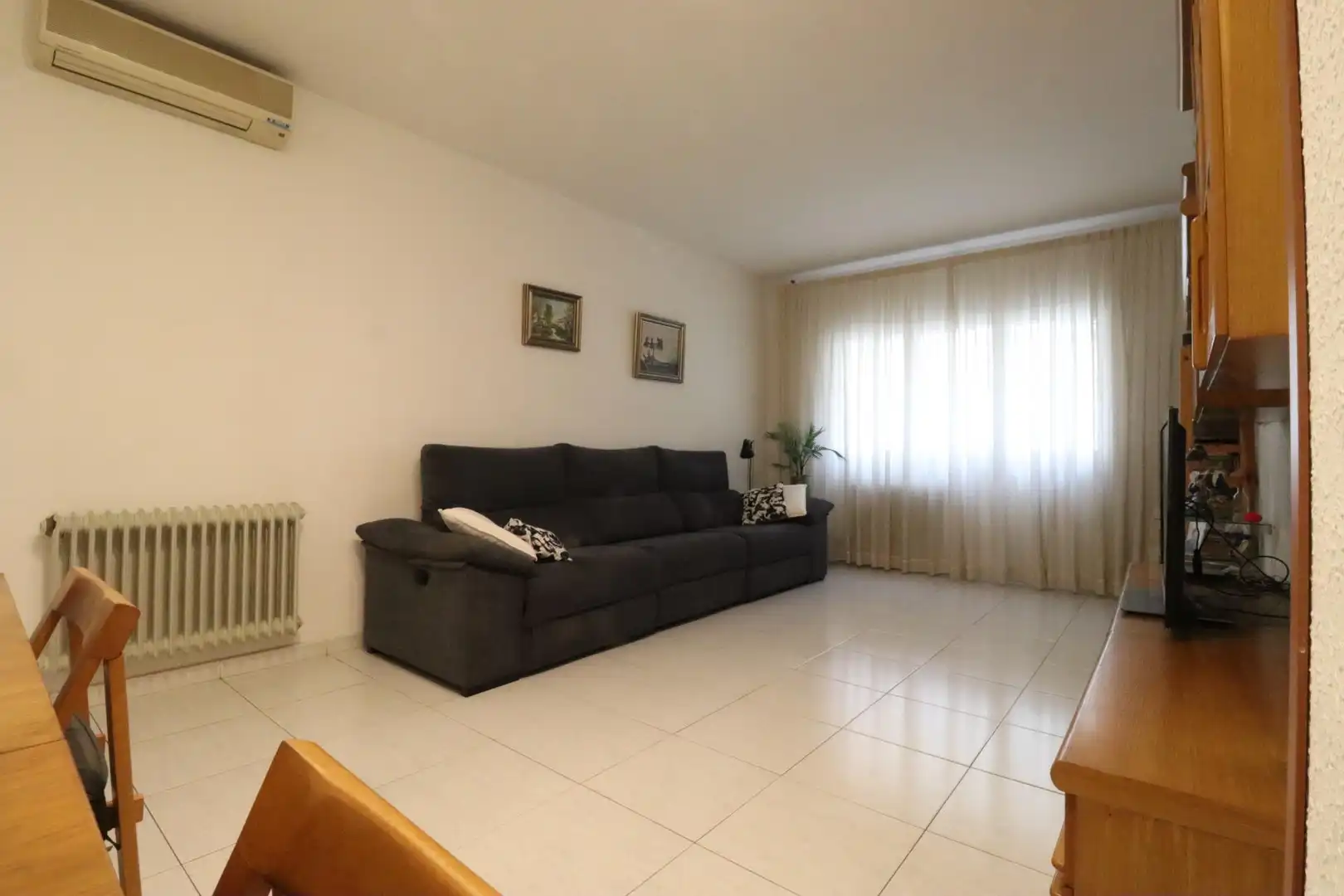 Wohnzimmer von Erdgeschoss zum Verkauf in Sabadell mit Klimaanlage, Heizung und Terrasse