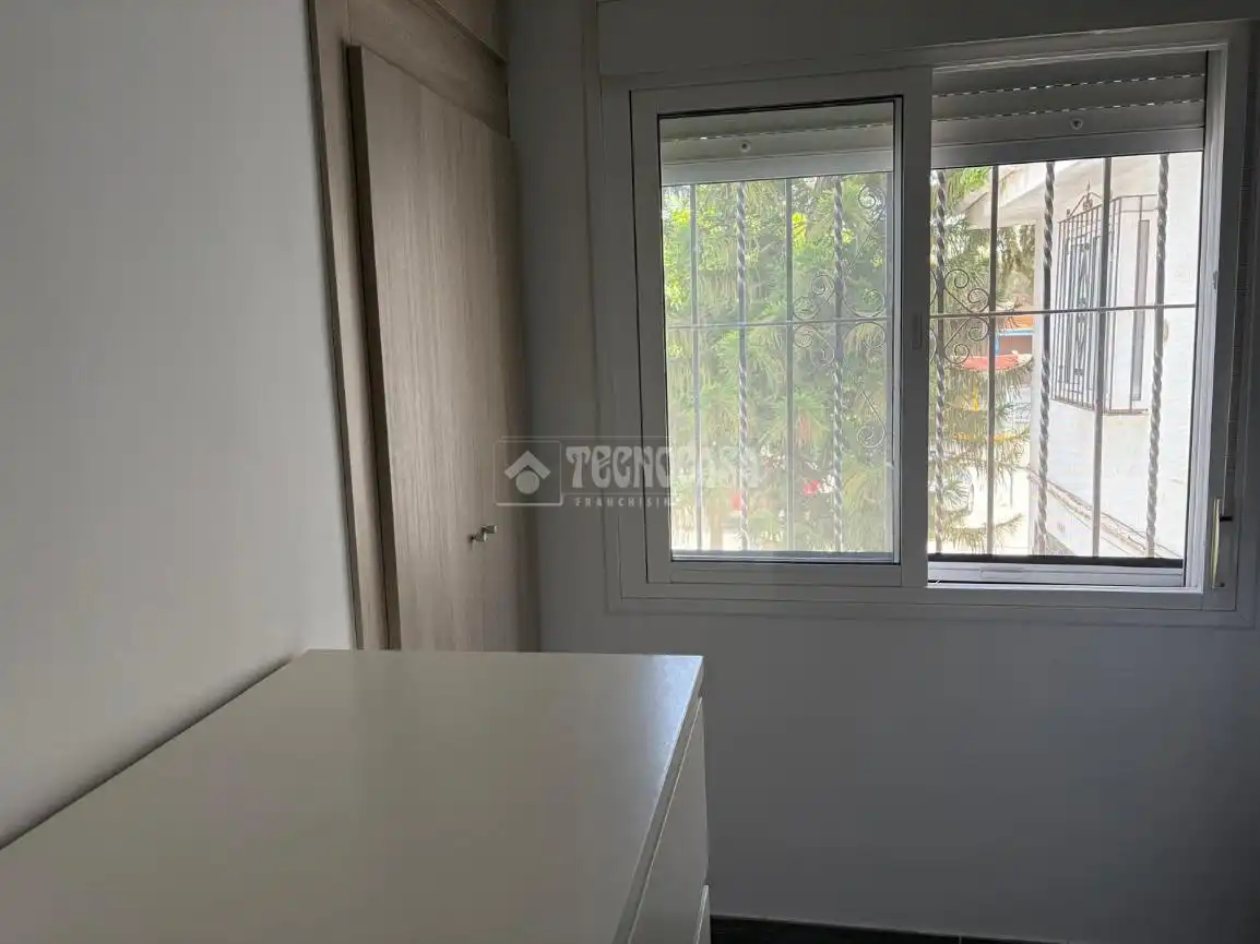 Habitación de Casa adosada en venta en Sevilla con Aire acondicionado