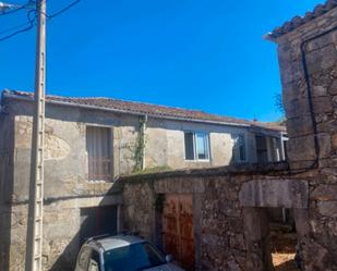 Vista exterior de Casa o xalet en venda en Entrimo amb Jardí privat