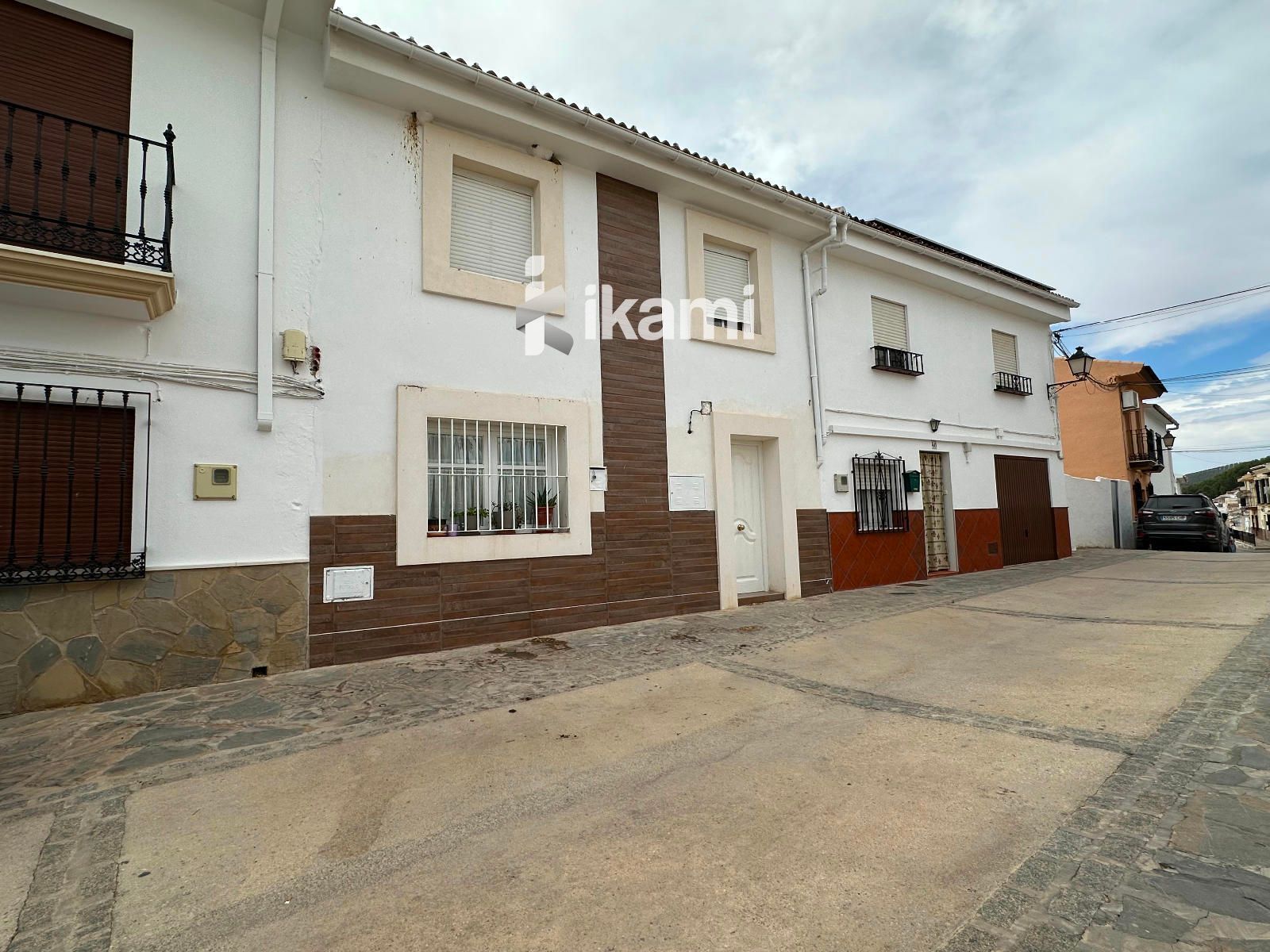 Exterior view of Single-family semi-detached for sale in Villanueva del Trabuco  with Air Conditioner, Heating and Terrace