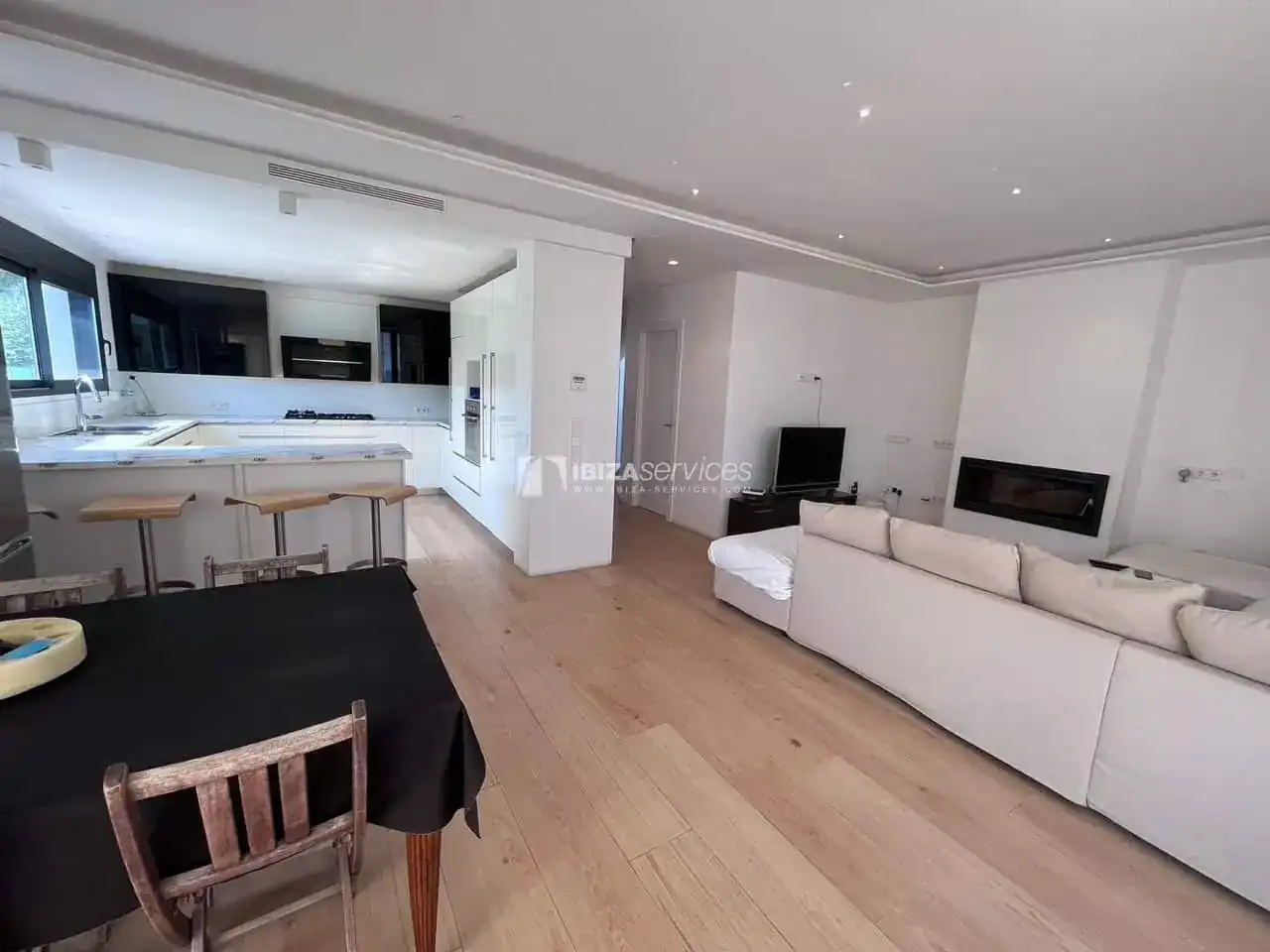 Sala d'estar de Casa o xalet en venda en Santa Eulària des Riu amb Aire condicionat, Jardí privat i Piscina