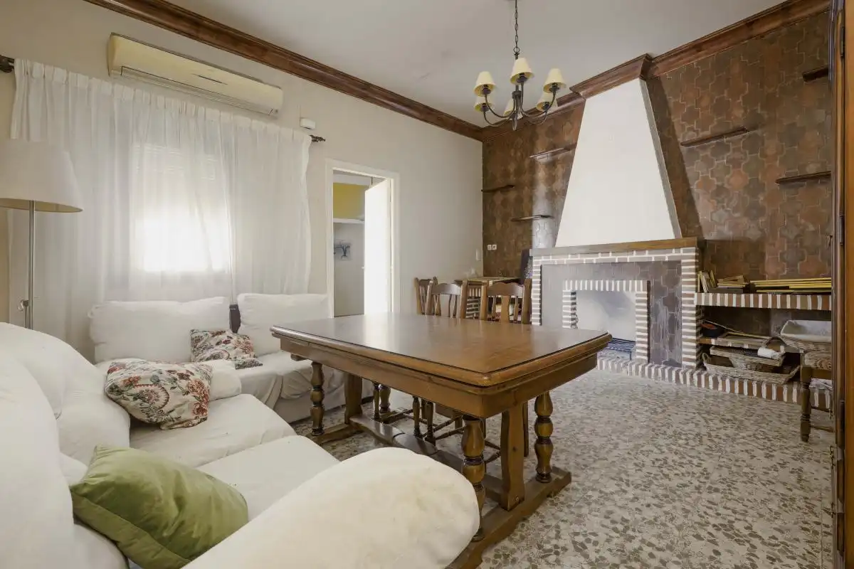 Sala de estar de Casa adosada en venta en Villanueva del Ariscal con Aire acondicionado, Calefacción y Terraza
