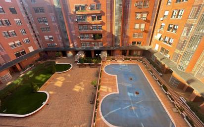 Swimming pool of Flat for sale in  Madrid Capital  with Heating, Private garden and Community pool