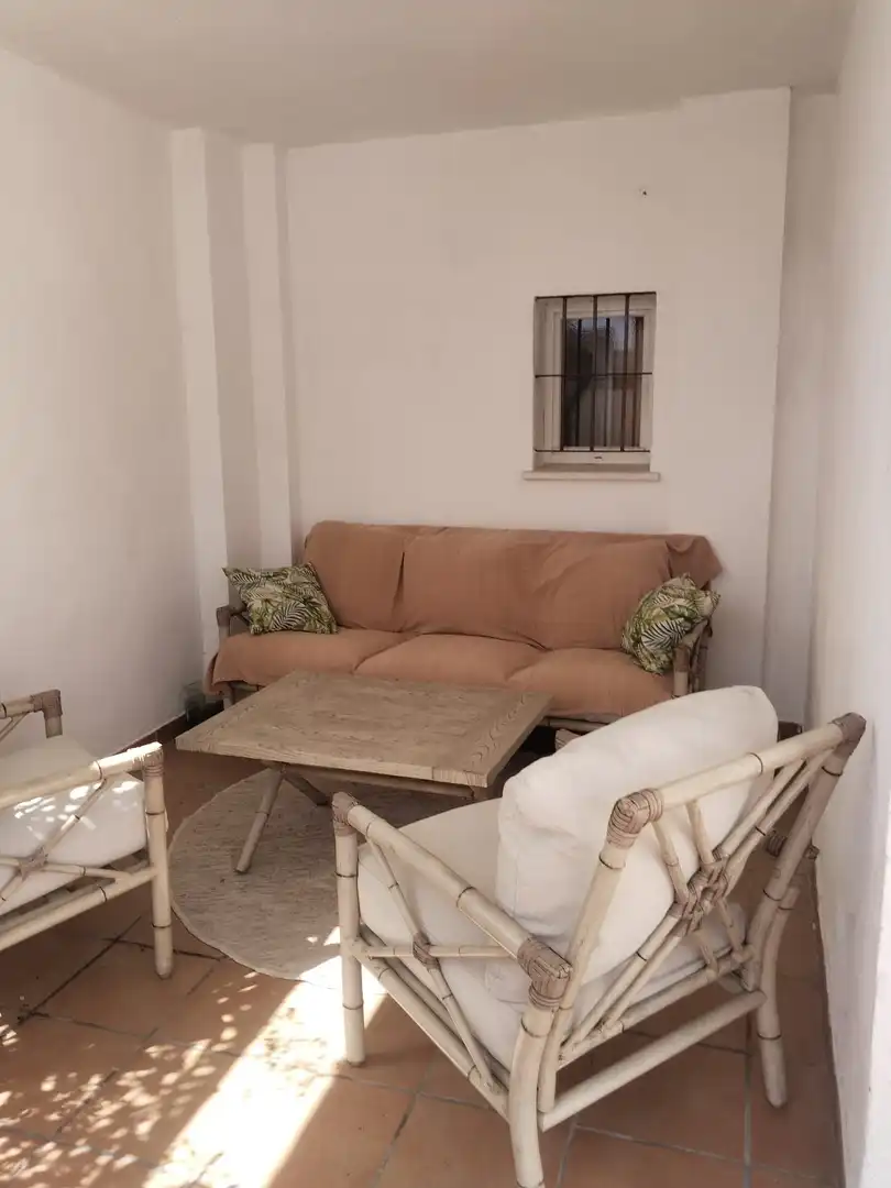 Sala de estar de Casa adosada en venta en Churriana