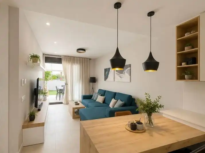 Sala de estar de Casa adosada de alquiler en Finestrat con Aire acondicionado, Jardín privado y Terraza