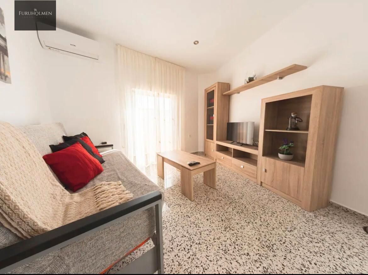 Living room of Flat for sale in  Granada Capital  with Heating, Terrace and Furnished