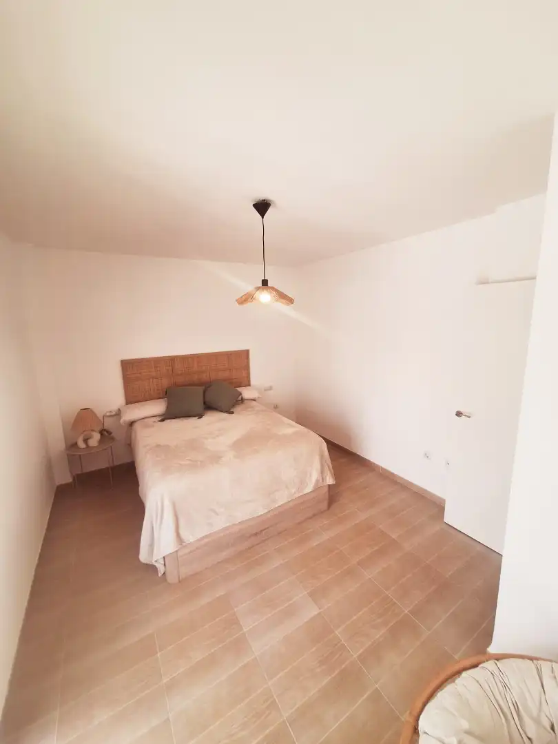 Schlafzimmer von Wohnung zum Verkauf in Balanegra mit Klimaanlage, Abstellraum und Gemeinschaftspool