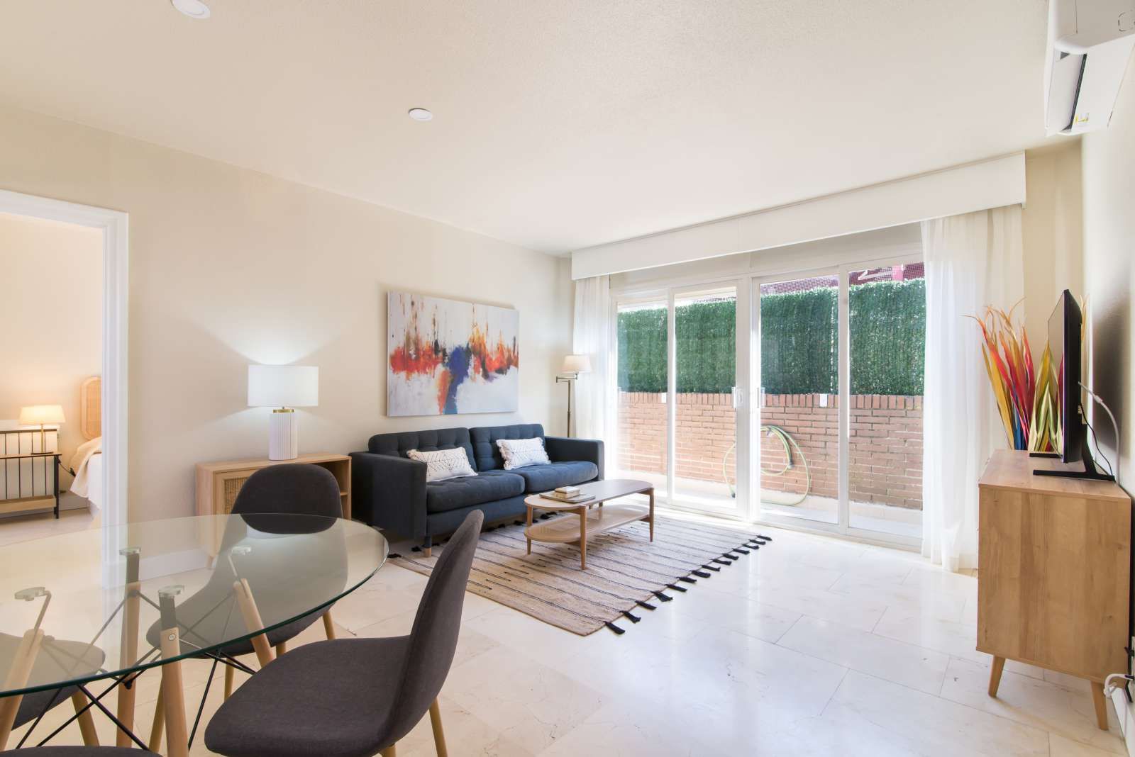 Living room of Study to share in  Madrid Capital  with Air Conditioner, Heating and Terrace