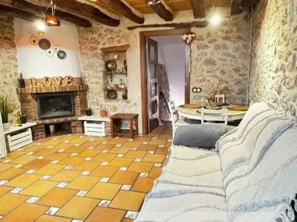 Sala de estar de Casa adosada en venta en El Pinell de Brai con Aire acondicionado, Trastero y Amueblado