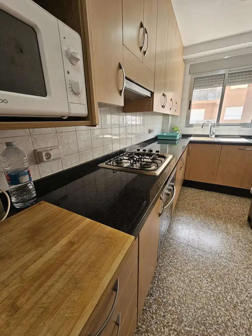 Cuina de Casa adosada en venda en Sueca amb Aire condicionat, Terrassa i Moblat