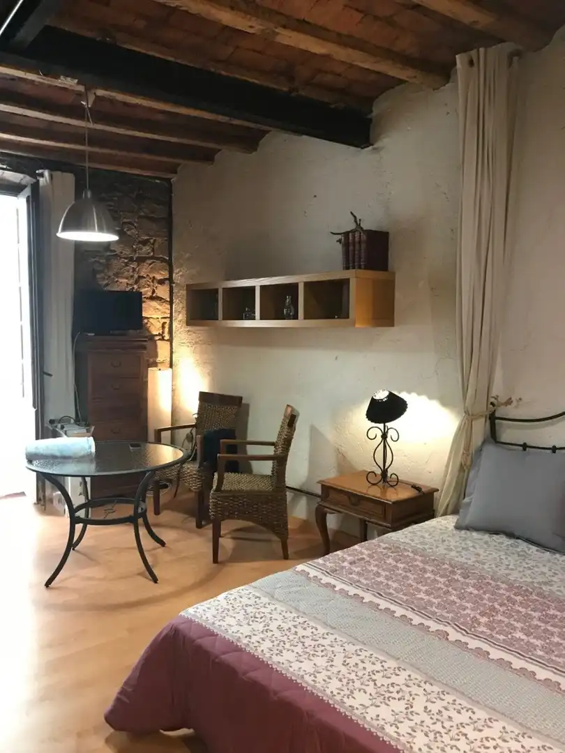 Sala d'estar de Estudi de lloguer en Barcelona amb Moblat i Balcó