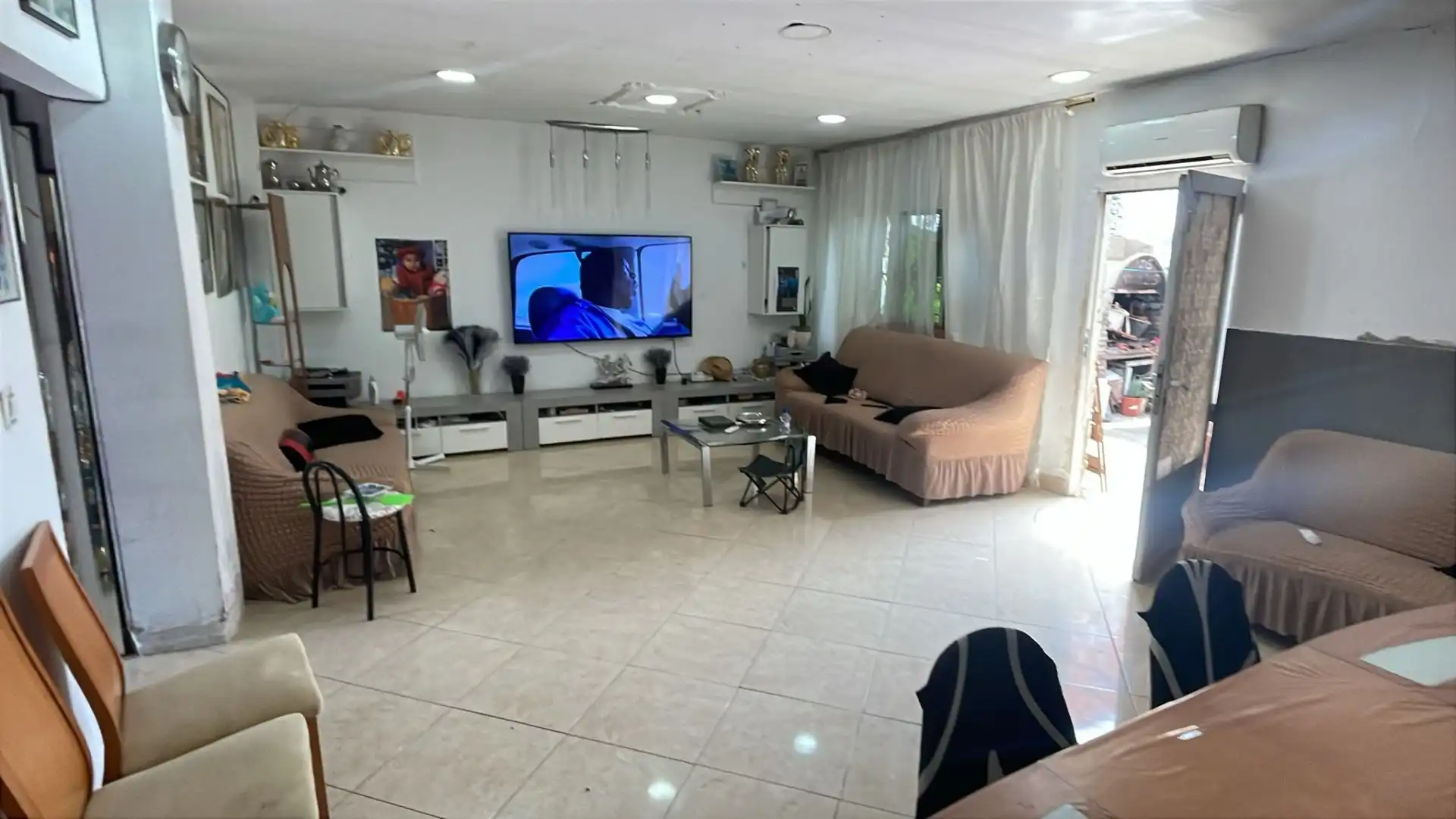 Sala de estar de Casa adosada en venta en Zaragoza con Aire acondicionado, Calefacción y Terraza
