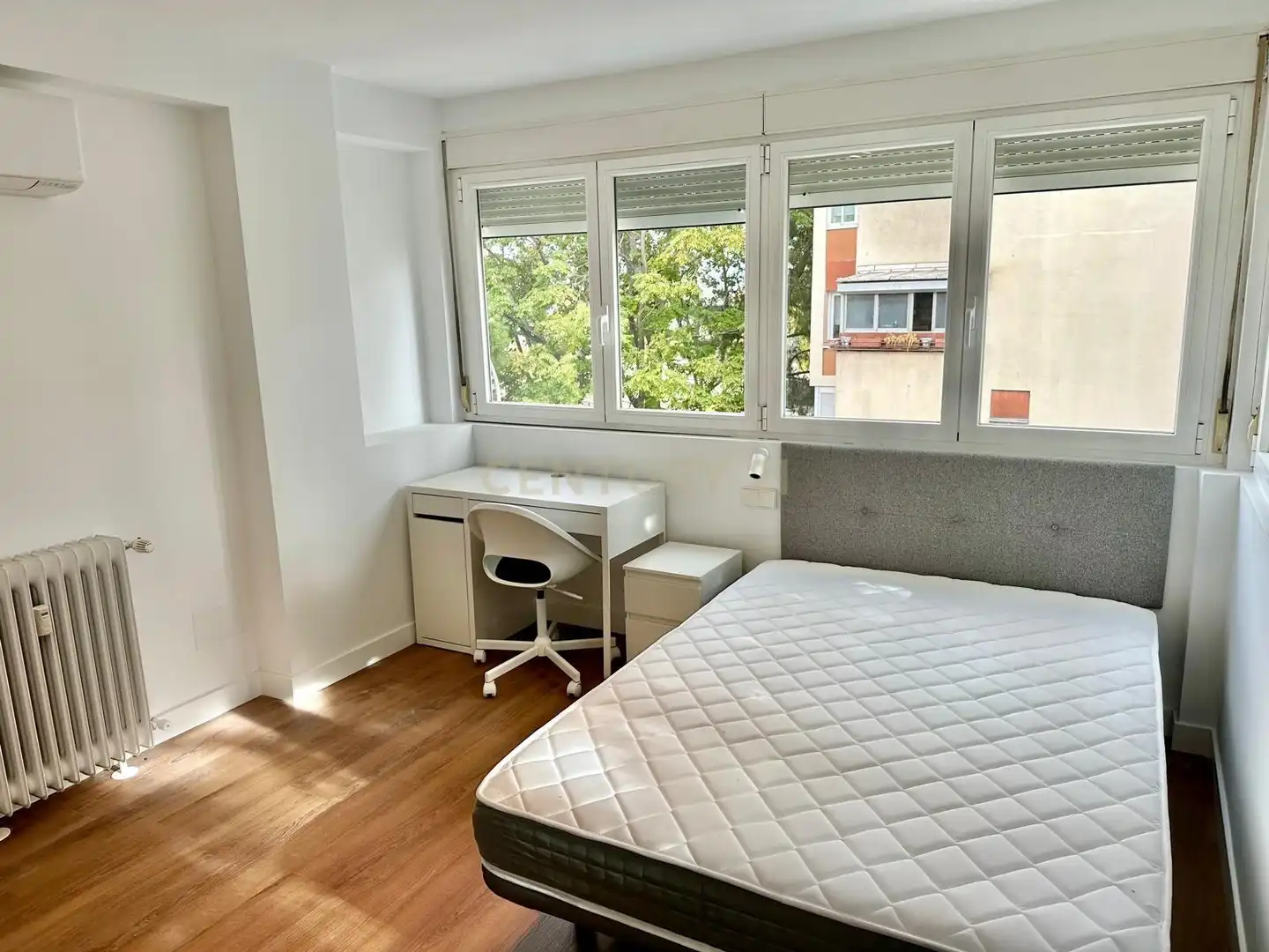 Dormitori de Apartament per a compartir en Madrid amb Aire condicionat, Forn i Rentadora