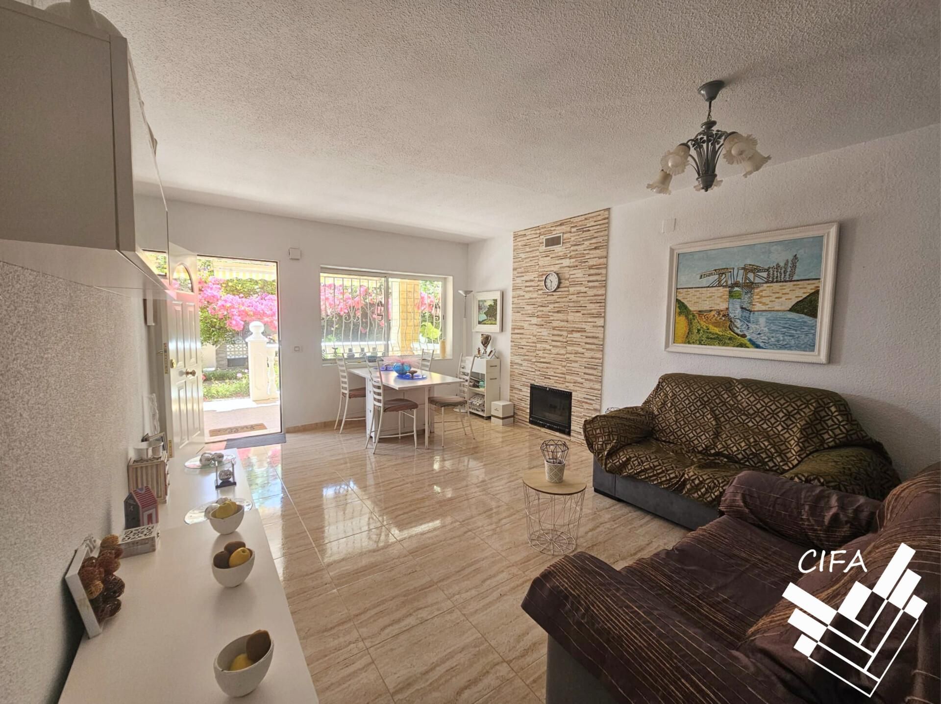 Sala de estar de Casa adosada en venta en Vinaròs con Terraza y Amueblado