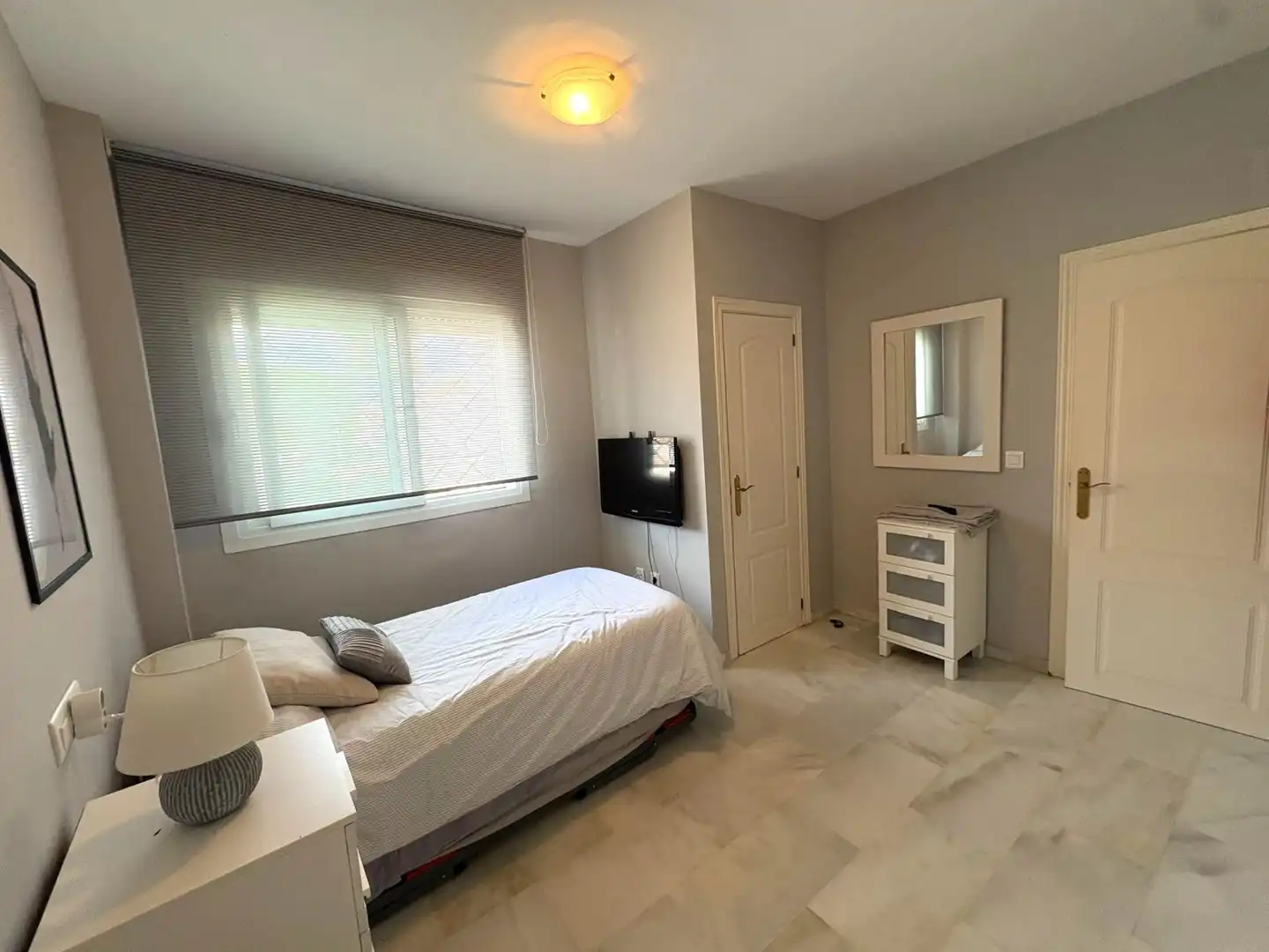 Habitación de Casa adosada en venta en El Portil con Calefacción, Terraza y Amueblado